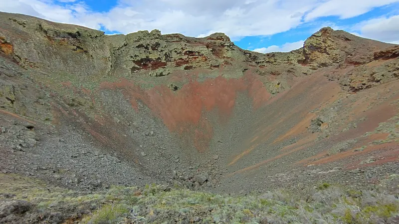Reddish volcanic crater in Pali Aike National Park